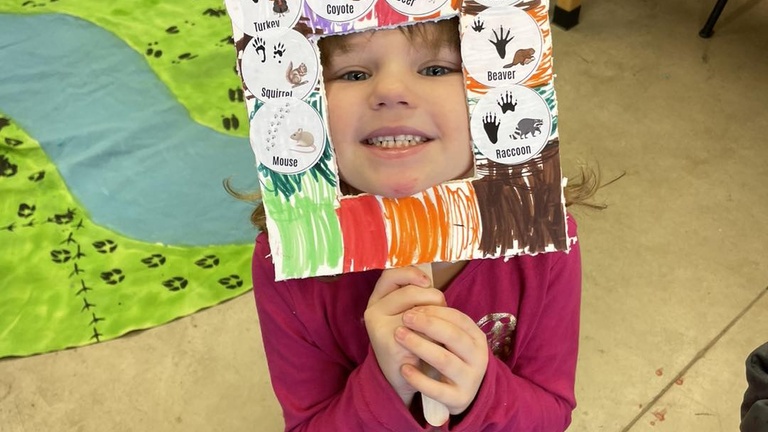 Student looking through track identifier